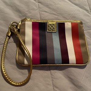 Coach Wristlet Satin Stripe Fabric With Gold Leather Detailing. Raspberry inside